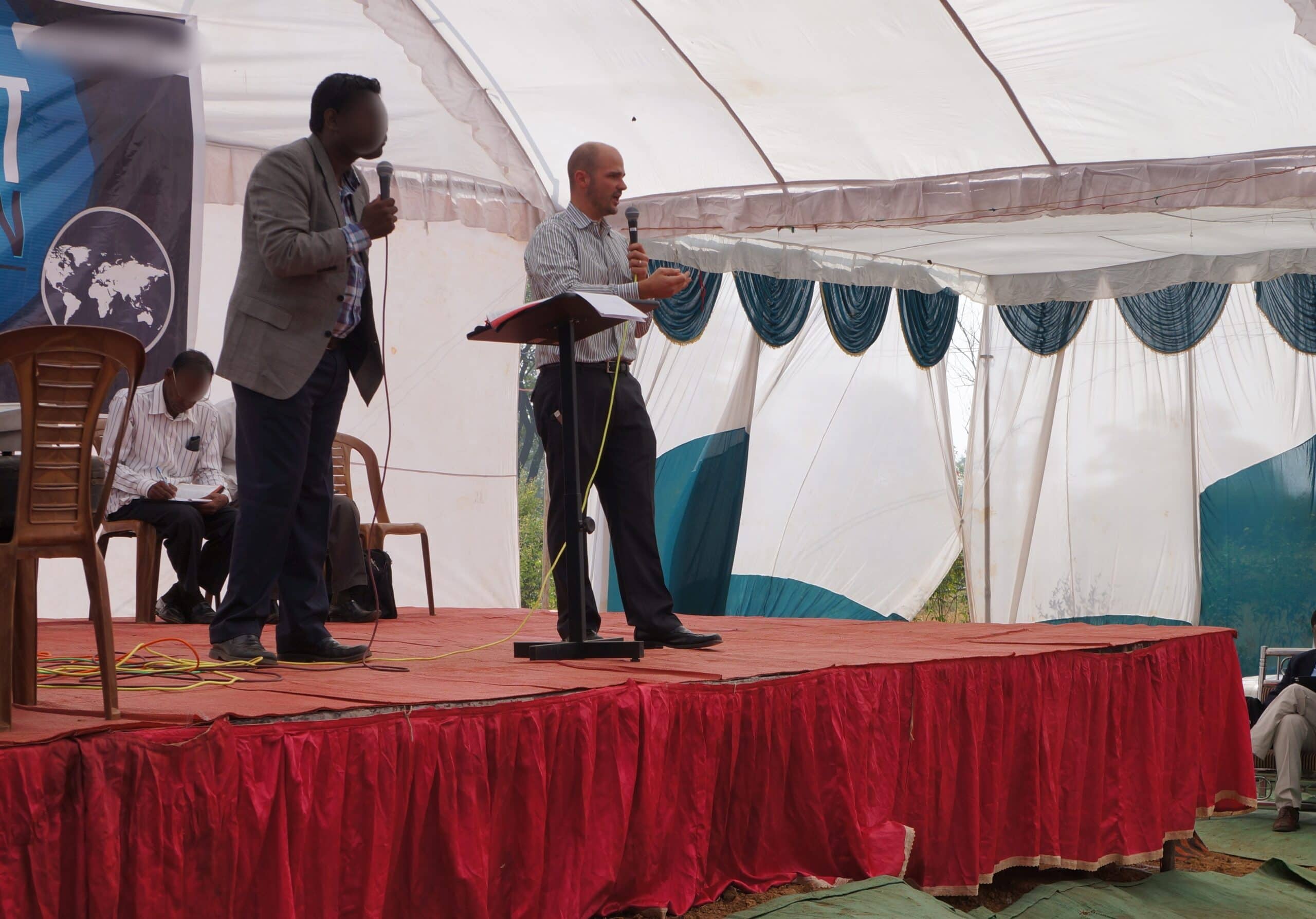 D - Christian speaking at pastors conf 1 (blur face)